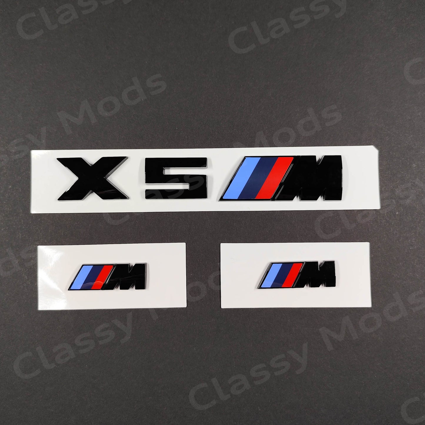 BMW X5M Gloss Black Badges Set