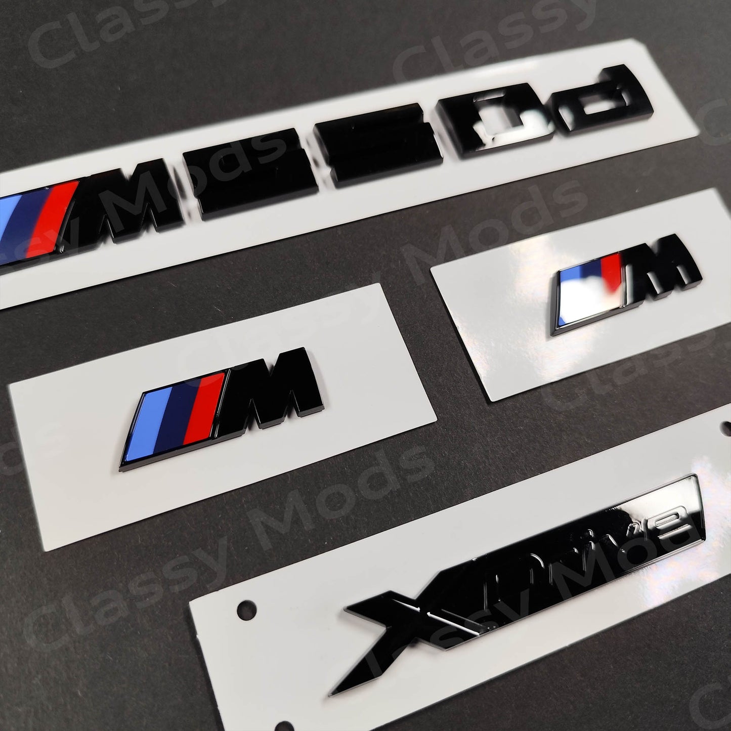 BMW M550d Gloss Black Badges Set