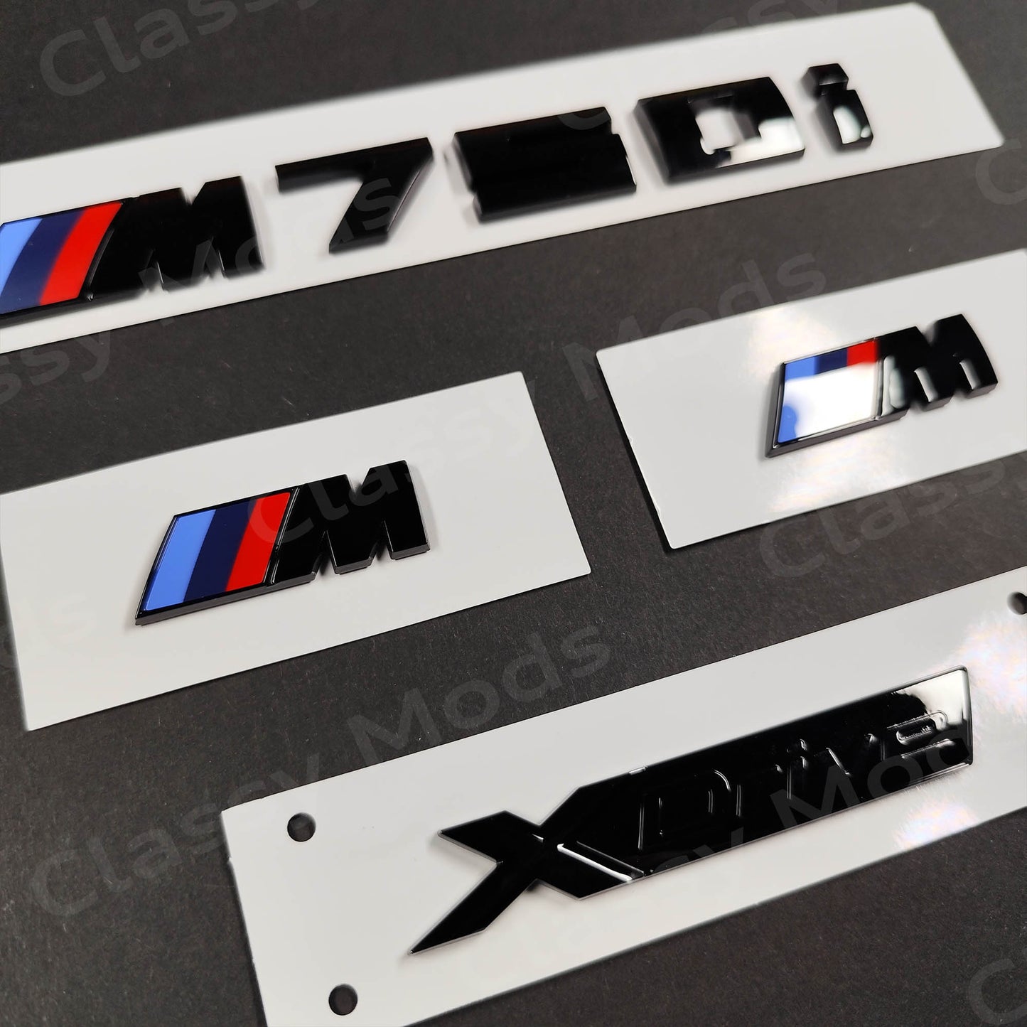 BMW M750i Gloss Black Badges Set