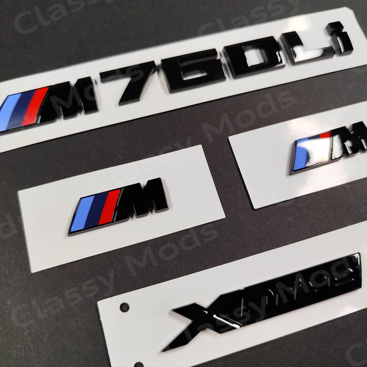 BMW M760Li Gloss Black Badges Set