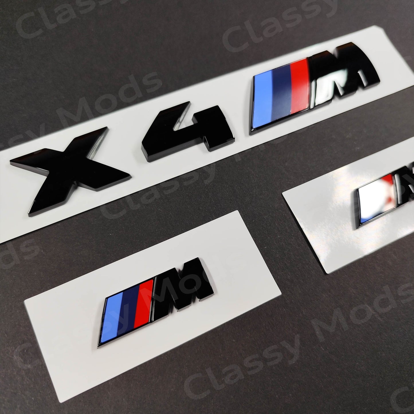 BMW X4M Gloss Black Badges Set