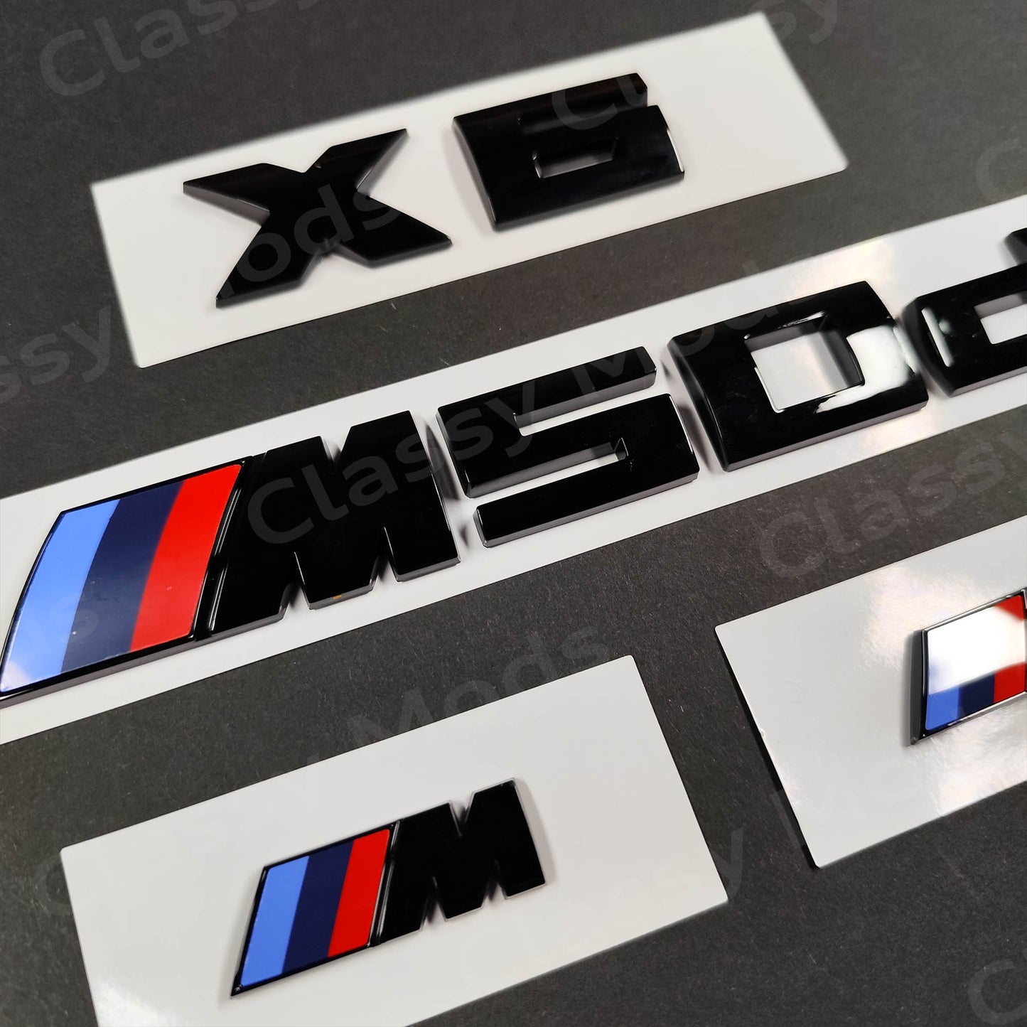 BMW X6 M50d Gloss Black Badges Set