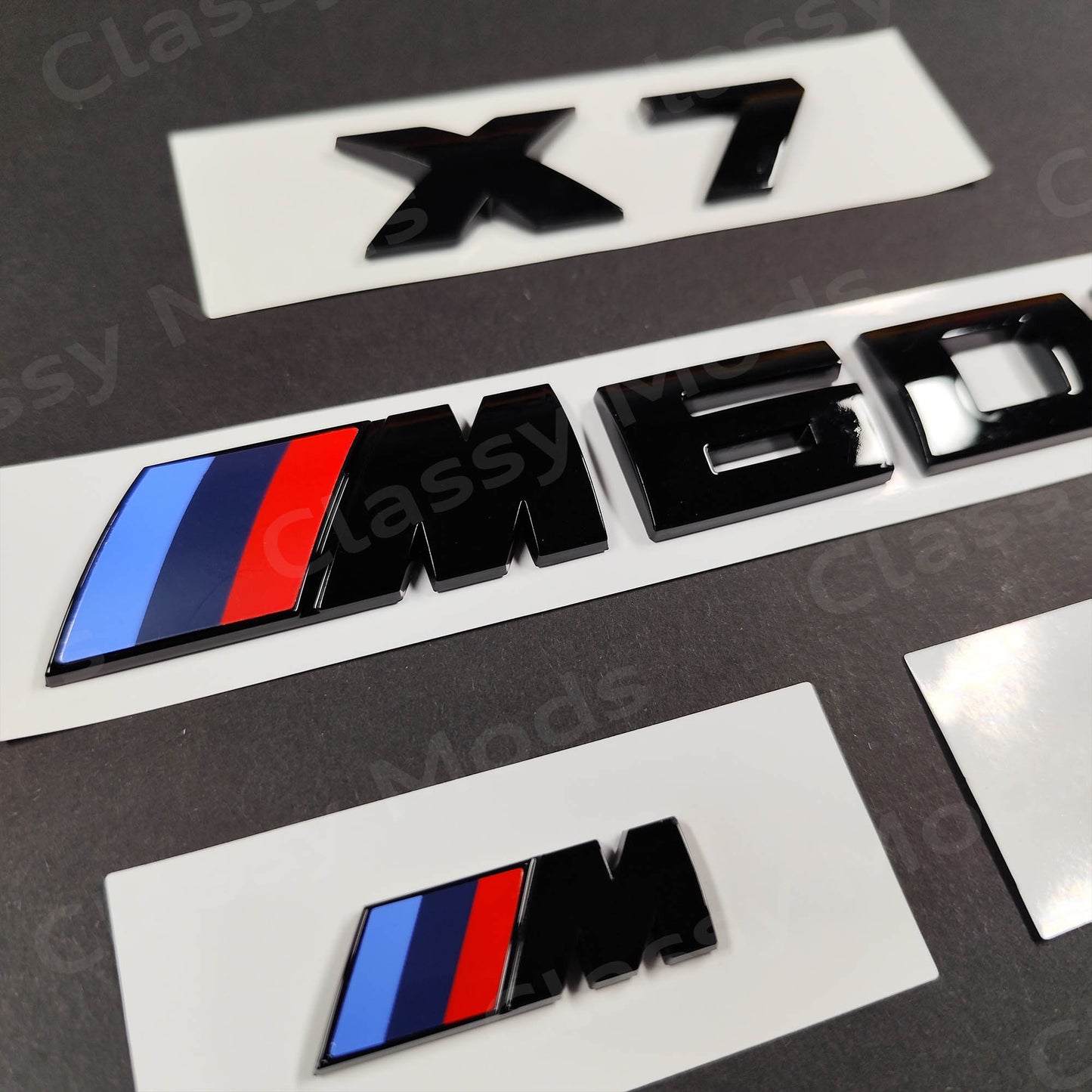 BMW X7 M60i Gloss Black Badges Set